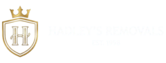 Hadley's Removals logo, gold crest with crown and H shield, established 1998